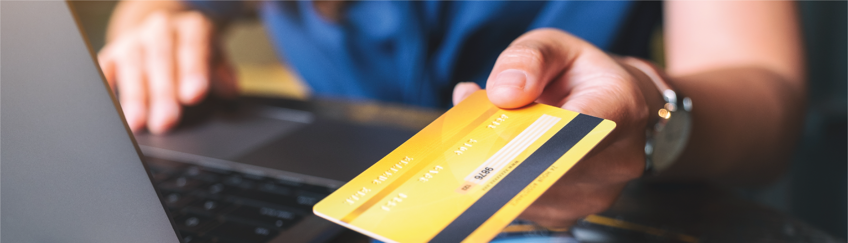 closeup image of yellow/gold debit card